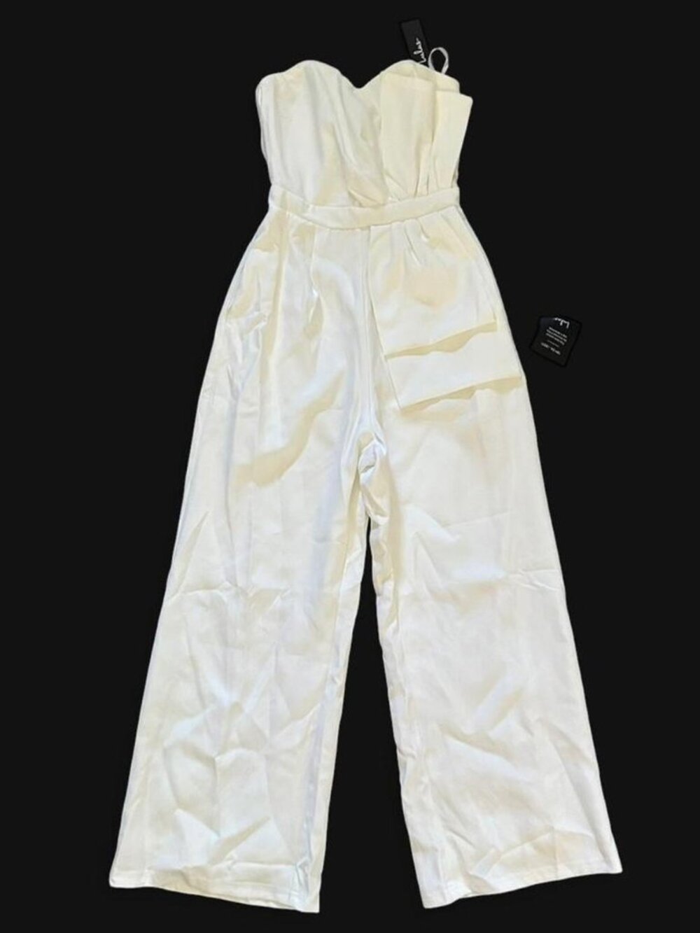Lulu's brand white strapless jumpsuit with bow/ruffle detail